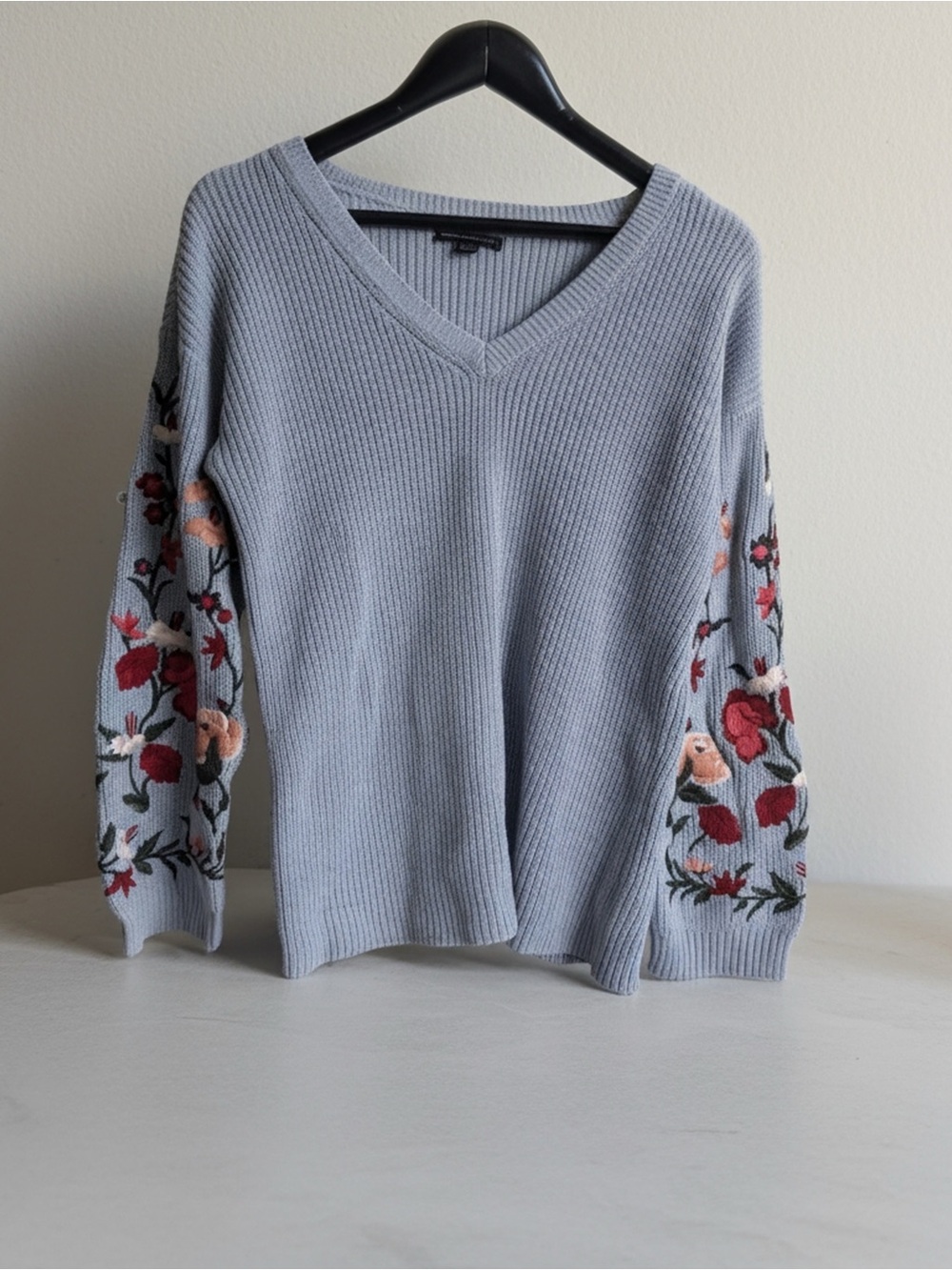Light Blue V-Neck Sweater with Embroidered Floral Sleeves